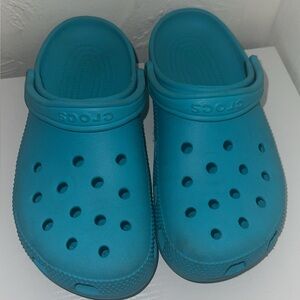 Teal crocs